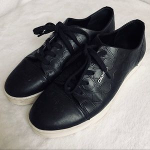 Calvin Klein women’s black leather sneakers